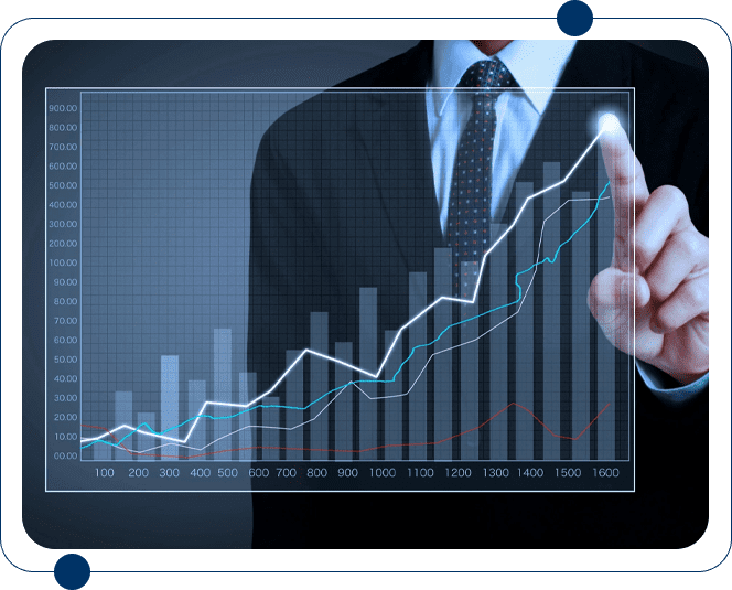 A man in a suit and tie points to an image of a bar graph.